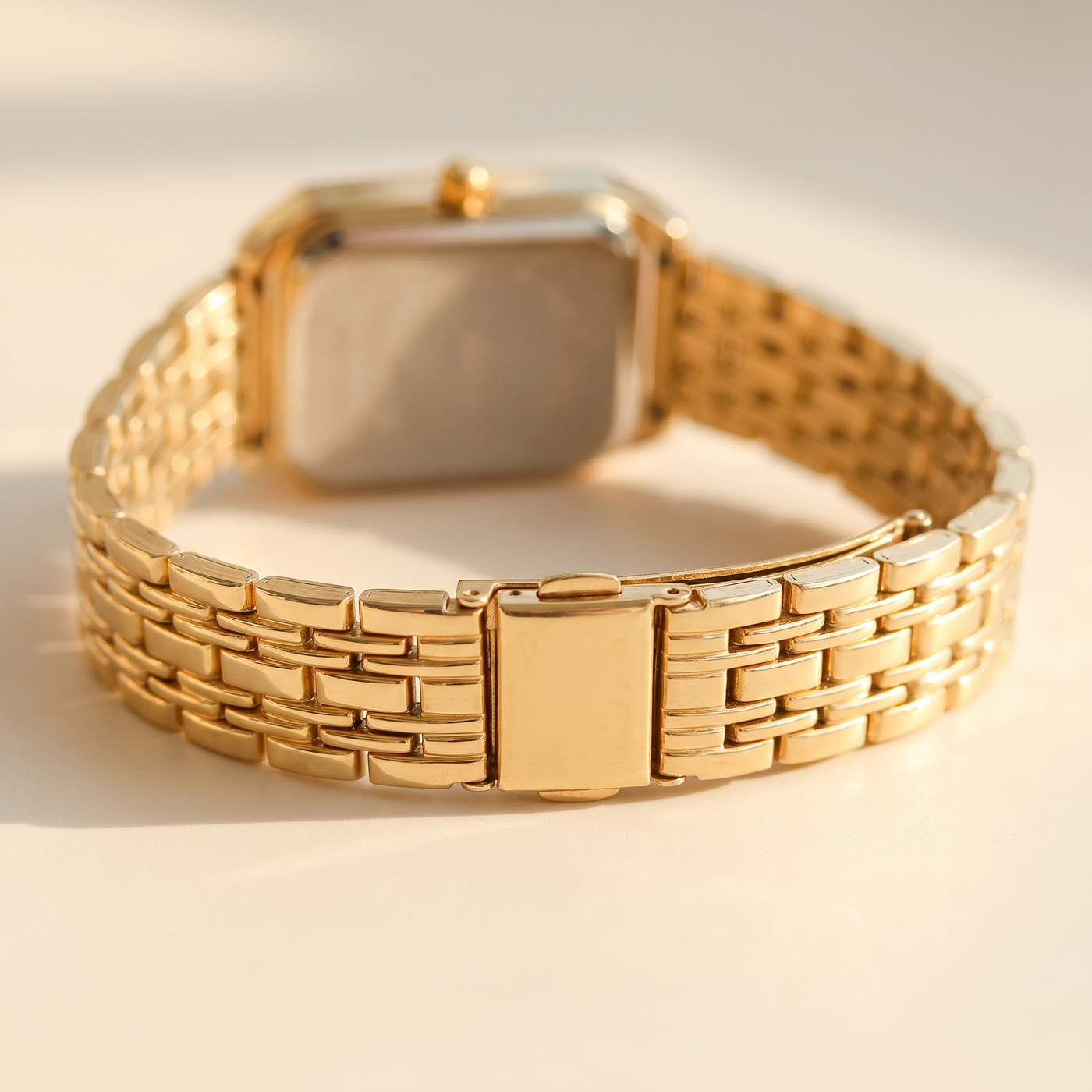 Close-up of the gold-tone link bracelet